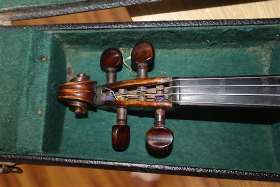 A late 19th / early 20th century Boosey & Co full size violin, cased with 2 bows